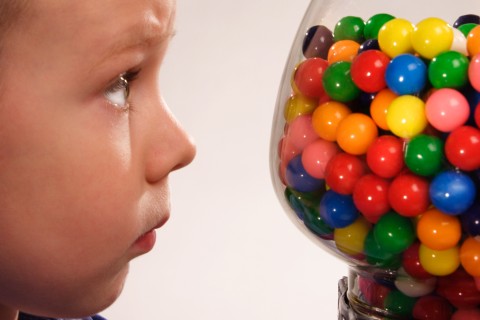 picture of boy and gumball machine