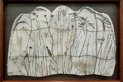 sculpture of impressions of plants from the tallgrass prairie 