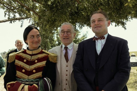 a film still from Killers of the Flower Moon featuring Leonardo DiCaprio and Lily Gladstone
