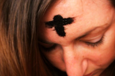 a cross made of ashes
