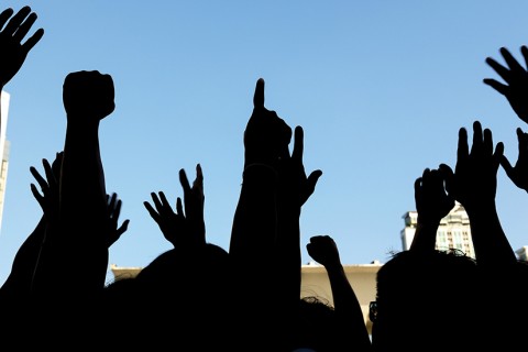 people raising hands