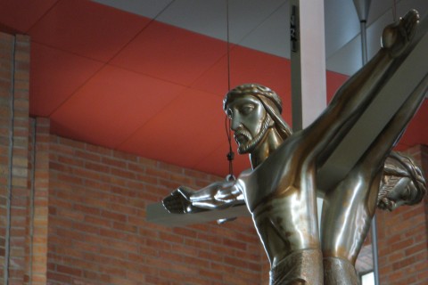 crucifix over an altar