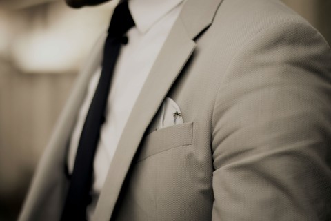 picture of torso of man in tidy suit