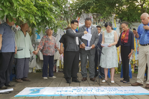 Picture of prayer vigil at the DMZ between North and South Korea