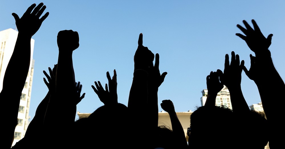 people raising hands