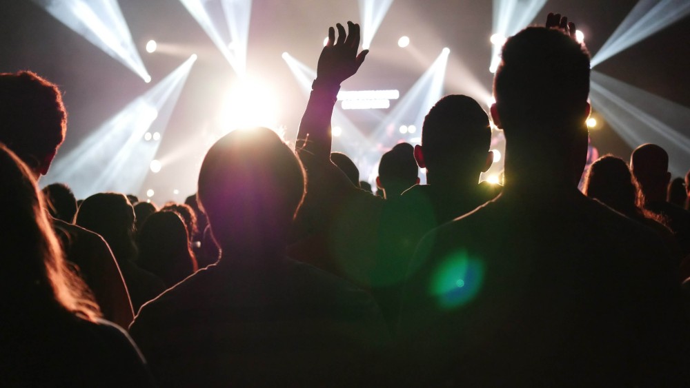 picture of charismatic worship in arena