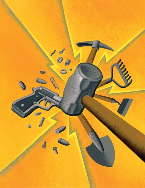 hammer beating gun into garden tools