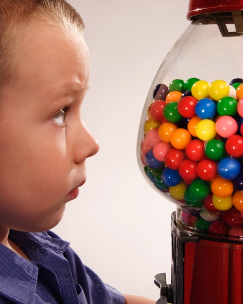 picture of boy and gumball machine