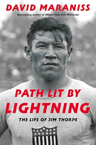 Black and white image of Jim Thorpe with red text overlay