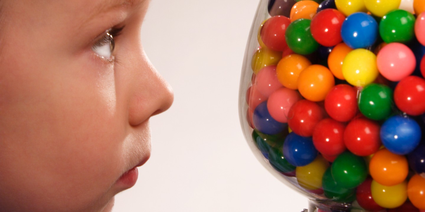 picture of boy and gumball machine