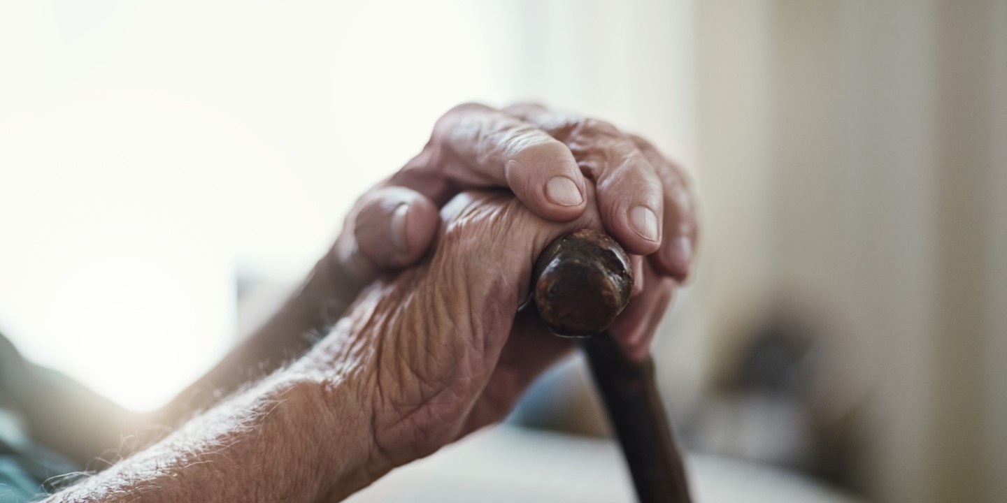 elderly man in chair