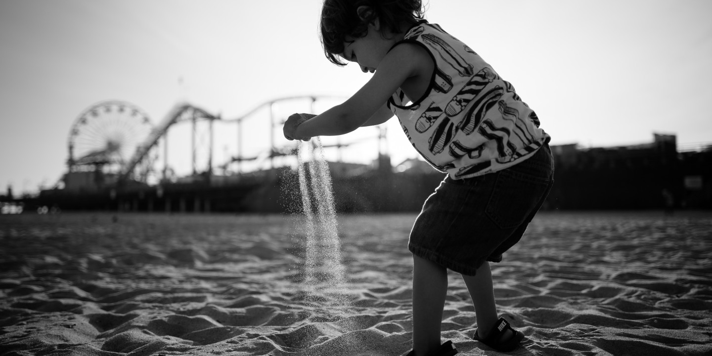 Child playing with sand