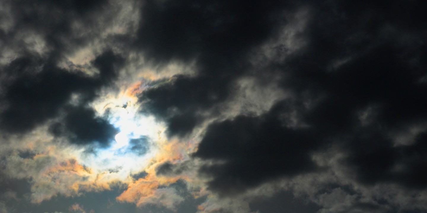 Dark clouds and sun