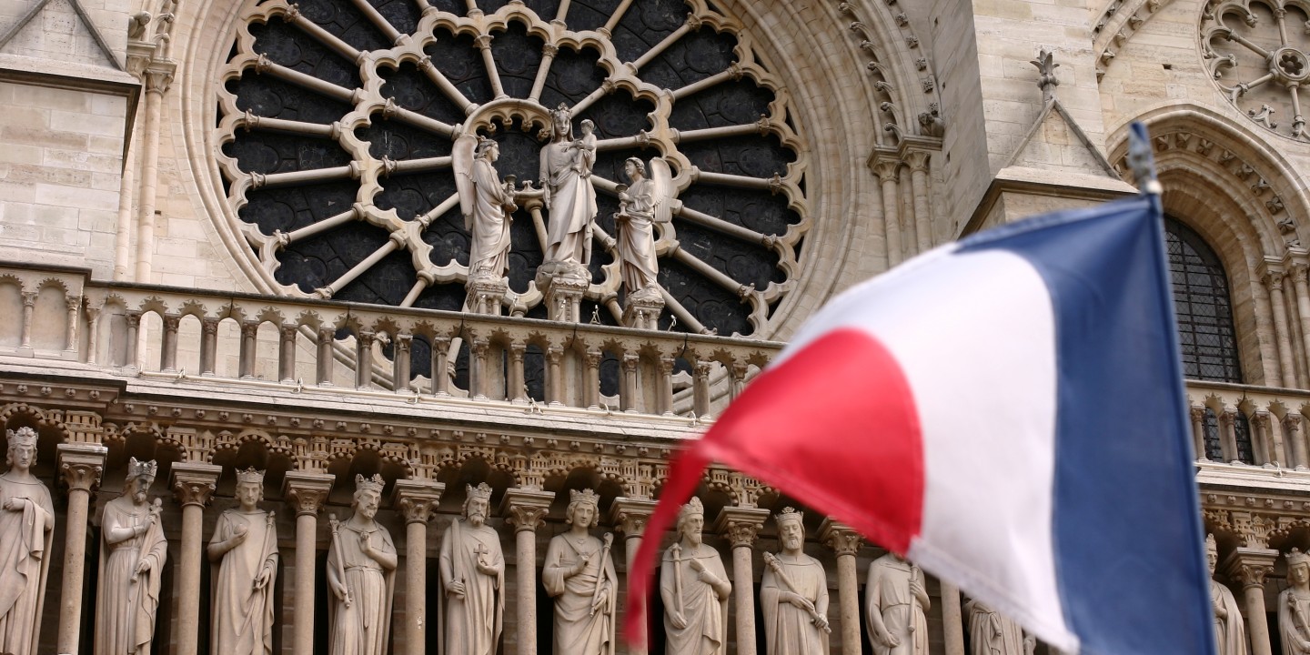French flag and church