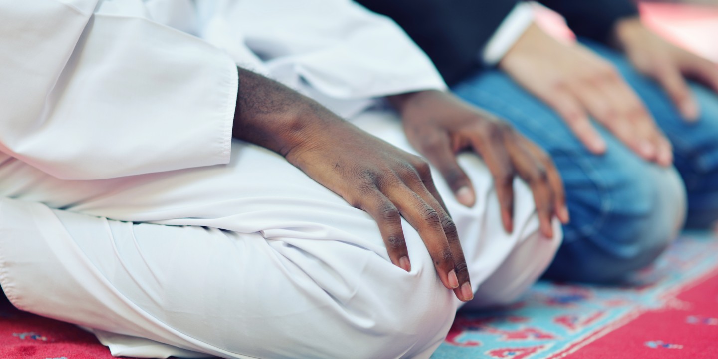 Muslim men praying