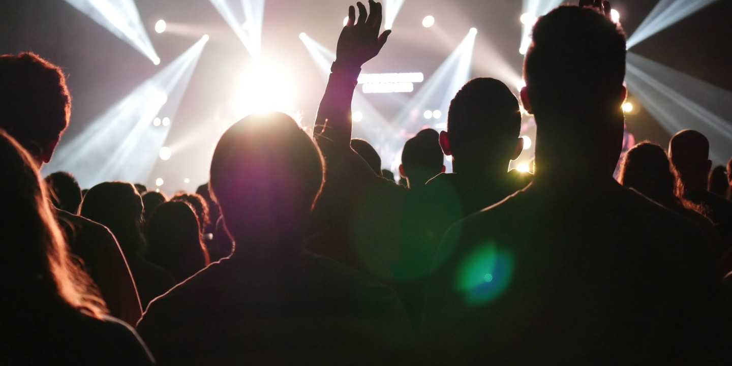 picture of charismatic worship in arena